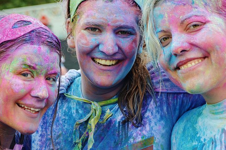 Three girls at cherry paint festival